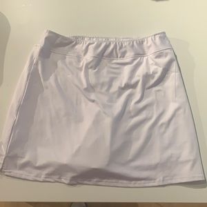 White women’s tennis/golf skirt